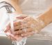 Caucasian woman washing her hands